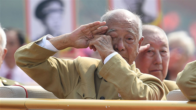 Photos of crying veteran saluting at National Day parade go viral