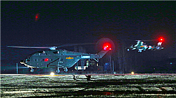 Multi-type helicopters train at night
