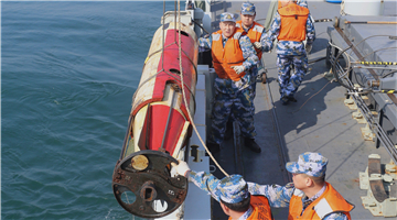 Sailors recover exercise torpedo