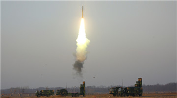 HQ-9 anti-aircraft missiles flare the sky
