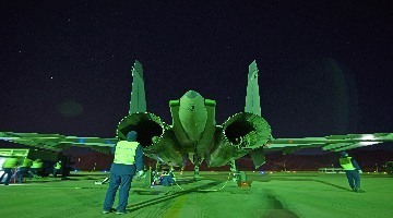 J-11 fighter jets prepare for night flight