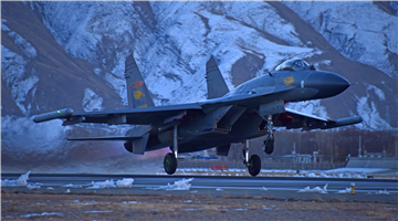 J-11 fighter jet takes off for flight training