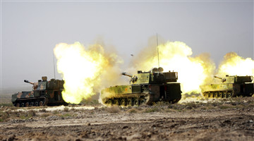 Self-propelled howitzer systems spit fires