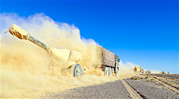 Military truck convoy maneuver to Gobi desert
