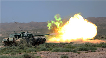 Main battle tank spits fires