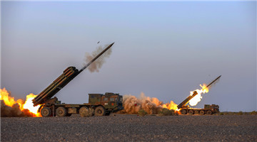 Multiple launch rocket systems fire at aerial targets