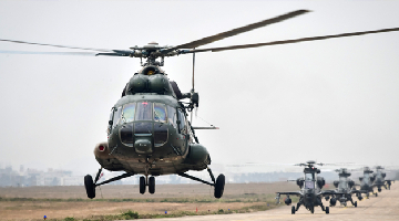 Multi-type helicopters lift off for real combat flight