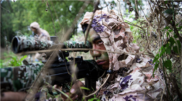Scouts sight in on targets in jungle