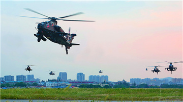 Attack helicopters fly at ultra-low altitude