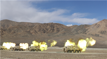 Vehicle-mounted howitzers fire high explosive shells