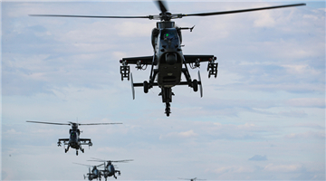 Multi-type attack helicopters fly at ultra-low attitude