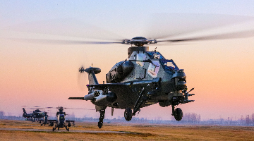 Attack helicopters hover at low altitude