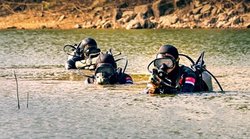 Frogmen dive into waters in sabotage operation