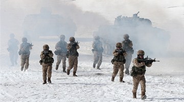 Combined-arms company conducts tactical exercise in snow field