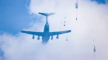 Paratroopers jump from Y-20 during round-the-clock training
